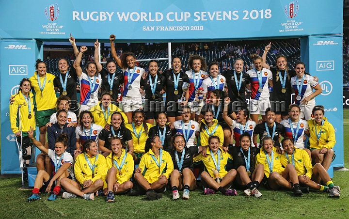 2018RugbySevensSat-55.JPG - The New Zealand (gold medal), French (silver medal) and Australian (bronze medal) teams celebrate following the women's championship finals of the 2018 Rugby World Cup Sevens, Saturday, July 21, 2018, at AT&T Park, San Francisco. (Spencer Allen/IOS via AP)